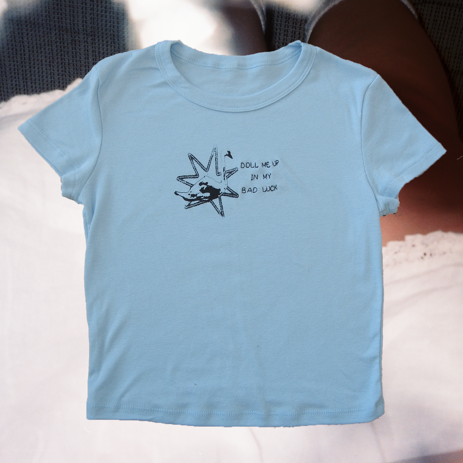 the doll tee
